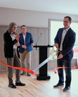 Geoff Bennett cuts the ceremonial ribbon with Debbie Windsor and Anthony Archibald looking on